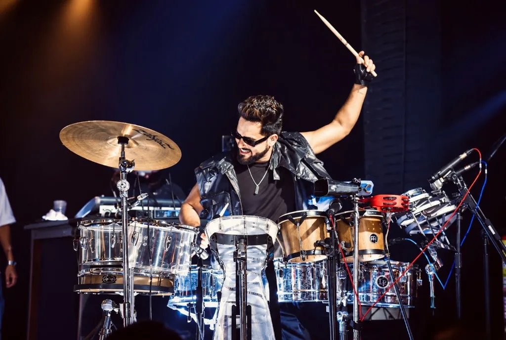 KKsonic live on stage with cymbals and percussion kit